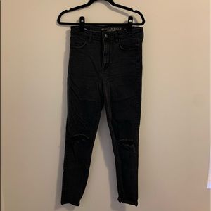 black american eagle jeans with knee holes.